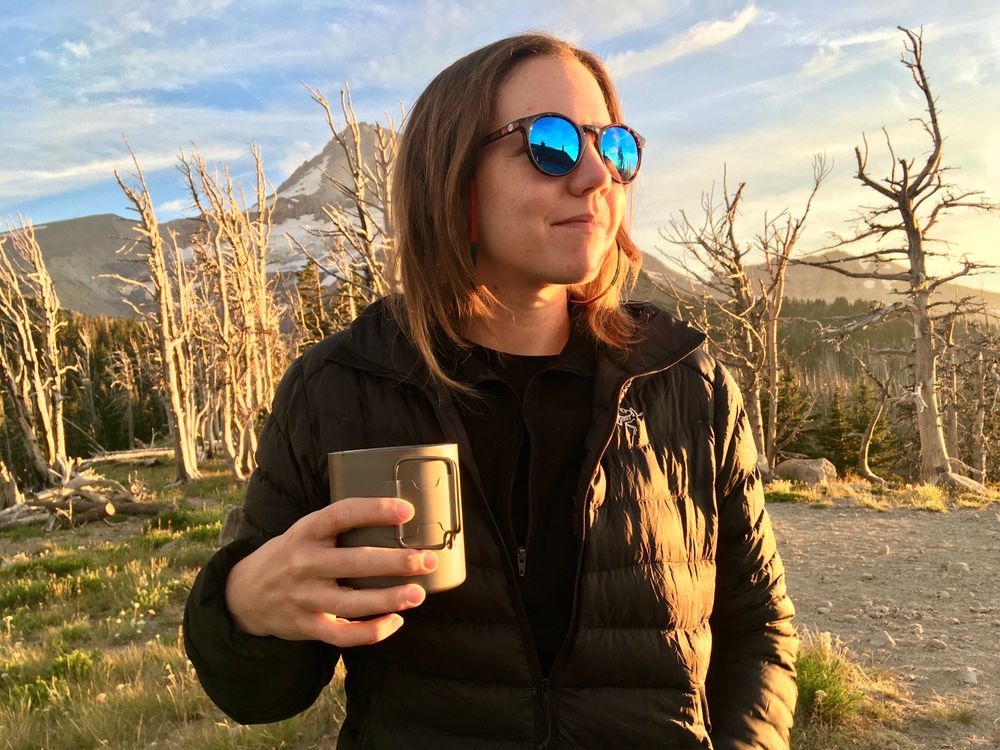 Laurel in sunglasses at sunset